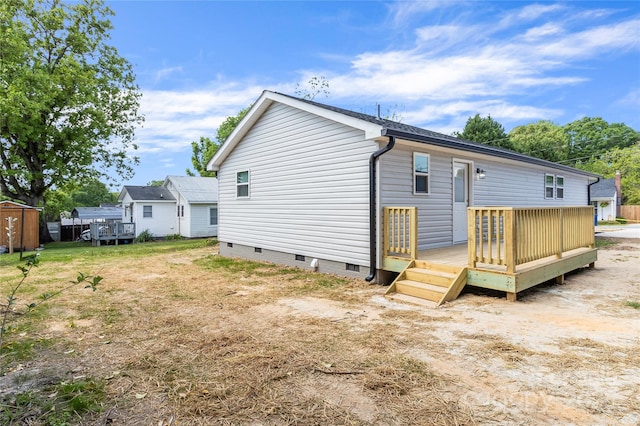 109 W Poplar St, Stanley, NC 28164 - rear view of property featuring a deck and crawl space