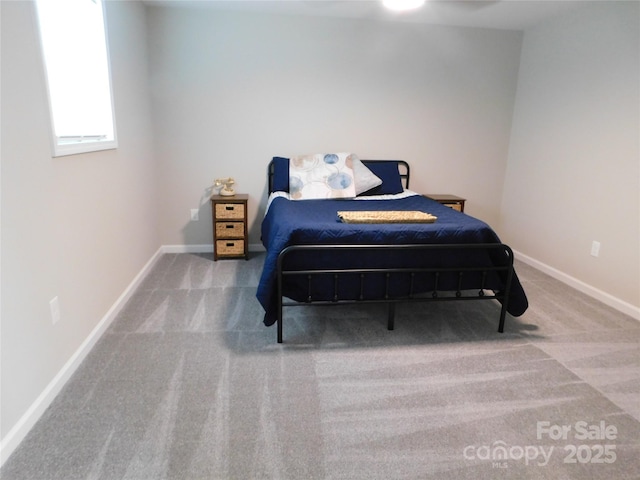 109 W Poplar St, Stanley, NC 28164 - carpeted bedroom featuring baseboards