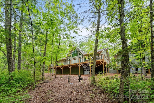 rear view of house with a deck