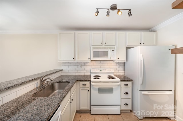 kitchen featuring white appliances, white cabinetry, crown molding, decorative backsplash, and a sink