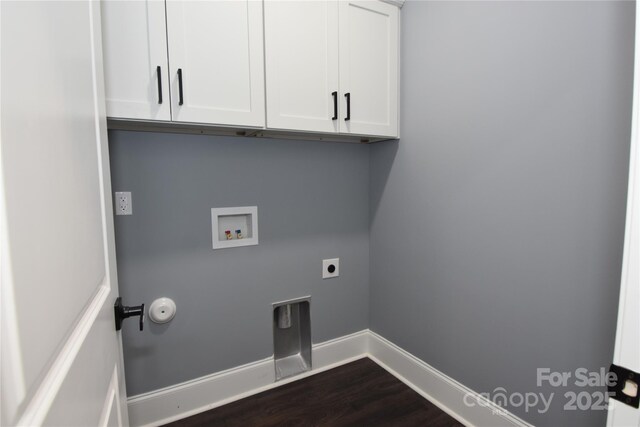 6519 Pargo Rd, Charlotte, NC 28216 - washroom featuring baseboards, dark wood-type flooring, cabinet space, washer hookup, and hookup for an electric dryer