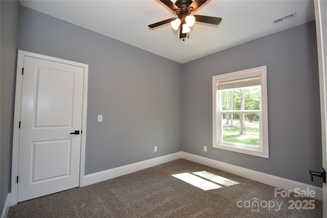 6519 Pargo Rd, Charlotte, NC 28216 - empty room with baseboards, a ceiling fan, carpet flooring, and visible vents