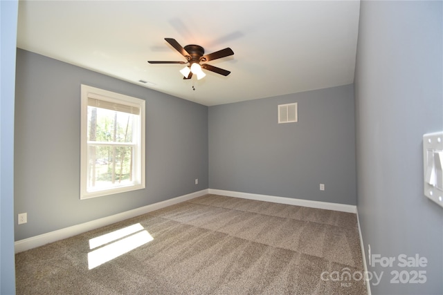 6519 Pargo Rd, Charlotte, NC 28216 - spare room with visible vents, carpet flooring, and ceiling fan