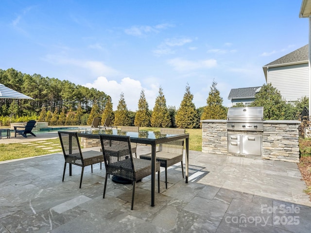 view of patio / terrace featuring area for grilling, an outdoor pool, outdoor dining space, and a grill
