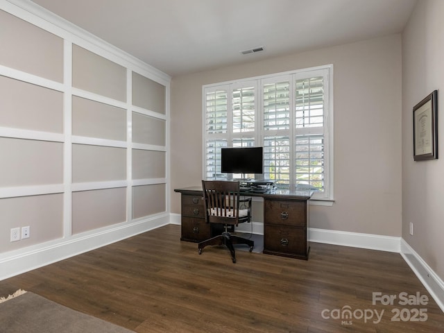 office with baseboards, dark wood-style floors, and visible vents