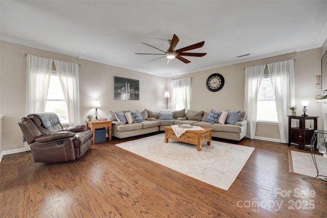 985 Angelica Ln, Tega Cay, SC 29708 - living room featuring ceiling fan, ornamental molding, dark wood finished floors, and a wealth of natural light