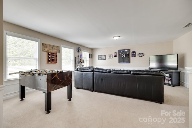 985 Angelica Ln, Tega Cay, SC 29708 - game room with a decorative wall, light colored carpet, visible vents, and a wainscoted wall