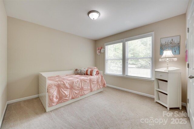 985 Angelica Ln, Tega Cay, SC 29708 - carpeted bedroom with baseboards