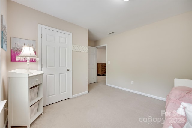 985 Angelica Ln, Tega Cay, SC 29708 - bedroom featuring baseboards and light carpet