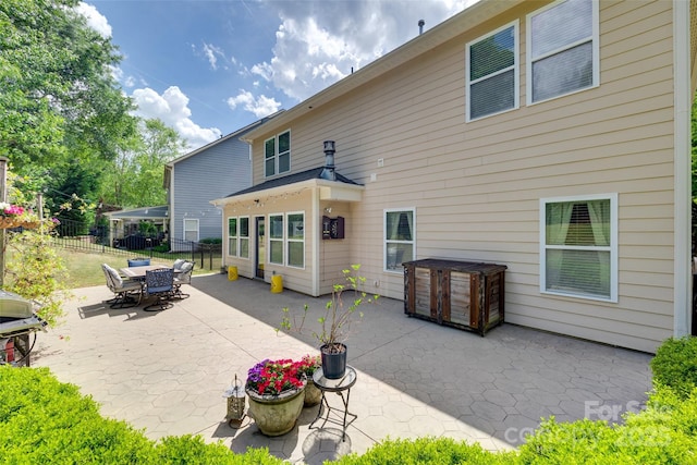 985 Angelica Ln, Tega Cay, SC 29708 - rear view of house featuring a patio, a hot tub, and fence