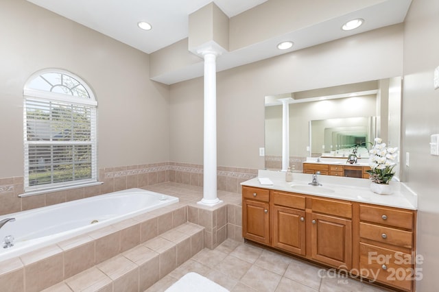 6941 Augustine Way, Charlotte, NC 28270 - bathroom with decorative columns, tile patterned floors, a bath, vanity, and recessed lighting
