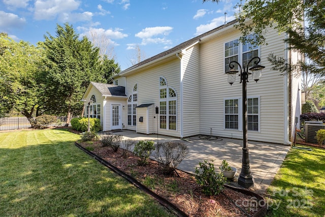 6941 Augustine Way, Charlotte, NC 28270 - rear view of house with a patio area and central AC