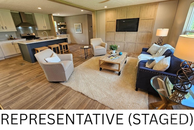 5989 Kaylas Ridge Rd, Connelly Springs, NC 28612 - living room featuring light wood-style floors and recessed lighting