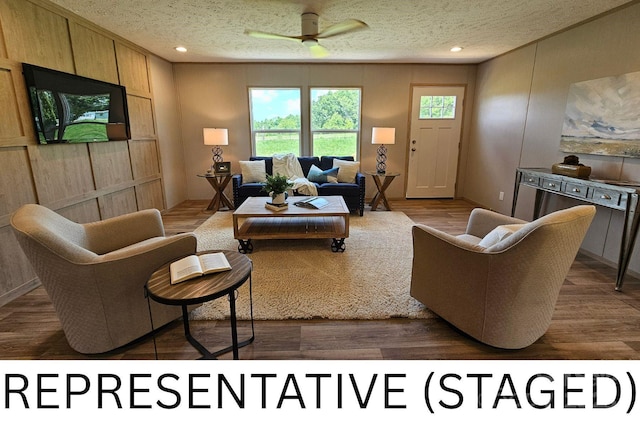 5989 Kaylas Ridge Rd, Connelly Springs, NC 28612 - living area with a ceiling fan, a textured ceiling, and recessed lighting