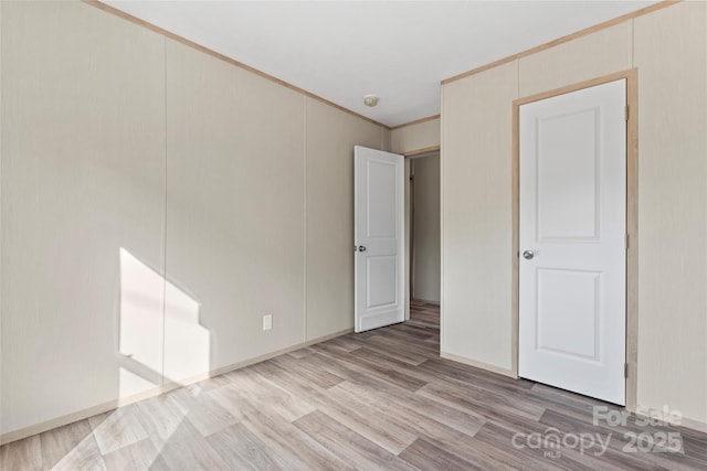 5989 Kaylas Ridge Rd, Connelly Springs, NC 28612 - unfurnished bedroom with wood finished floors and ornamental molding
