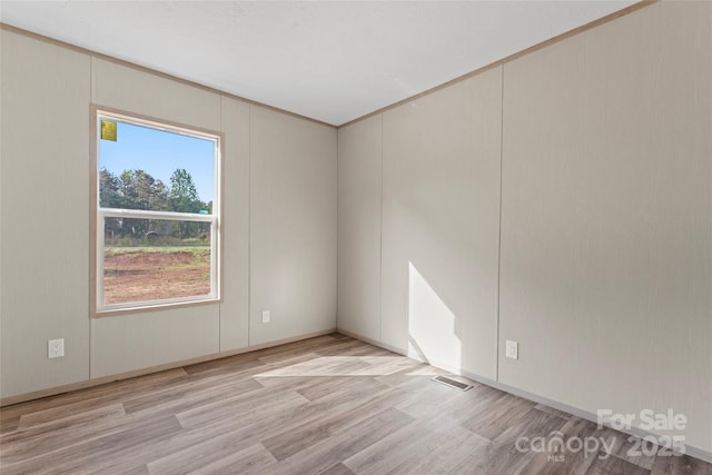 5989 Kaylas Ridge Rd, Connelly Springs, NC 28612 - spare room featuring light wood-type flooring