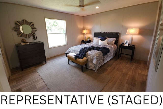 5989 Kaylas Ridge Rd, Connelly Springs, NC 28612 - bedroom featuring wood finished floors and a ceiling fan