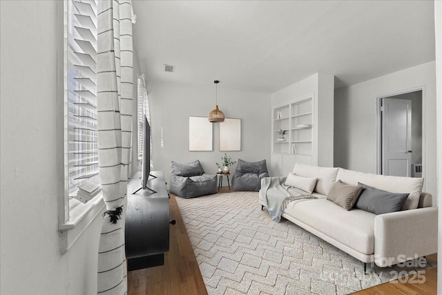 343 Wakefield Dr Unit C, Charlotte, NC 28209 - living area featuring wood finished floors