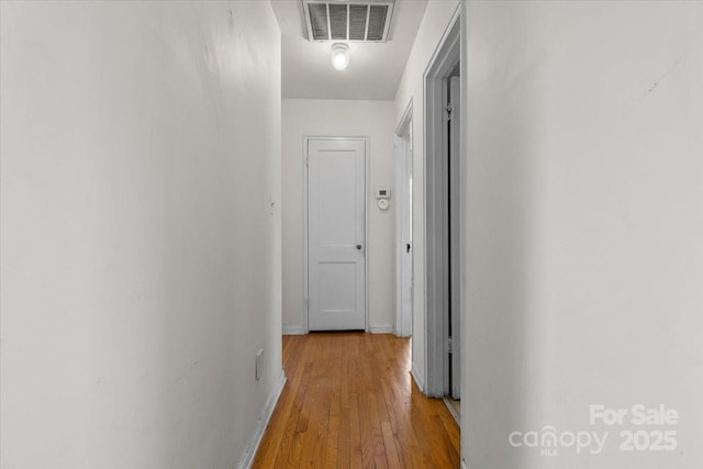 343 Wakefield Dr Unit C, Charlotte, NC 28209 - hallway featuring hardwood / wood-style floors and baseboards