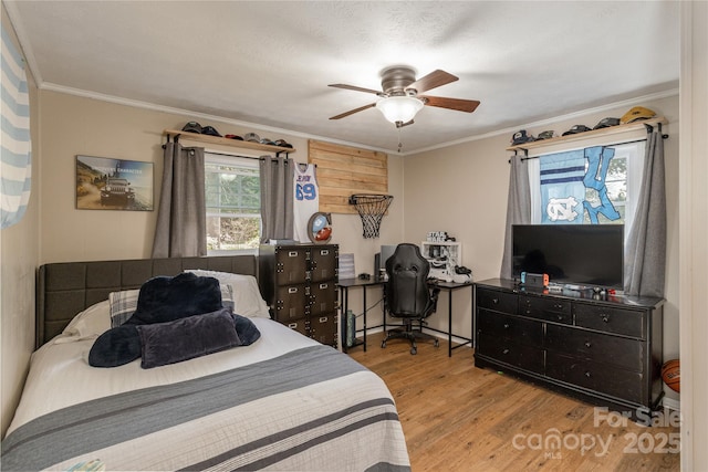 215 Shannon Rd, Hendersonville, NC 28791 - bedroom featuring a ceiling fan, wood finished floors, and ornamental molding