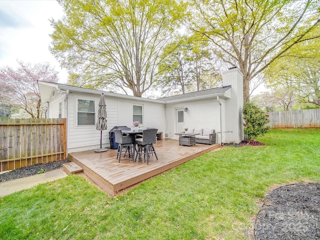 rear view of house featuring a chimney, a fenced backyard, an outdoor hangout area, outdoor dining space, and a deck