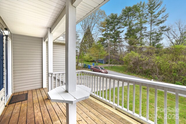 510 Laurel St, Hendersonville, NC 28792 - wooden terrace with a porch and a lawn