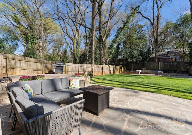 view of patio / terrace featuring a fenced backyard and an outdoor living space