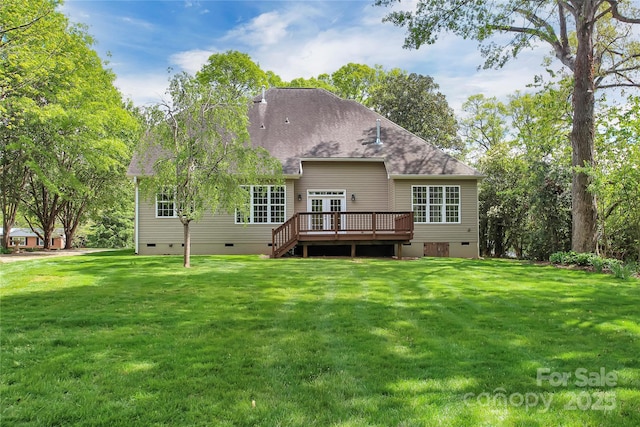 back of house featuring a yard, a wooden deck, crawl space, and roof with shingles