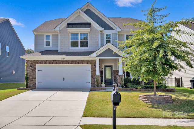 15127 Oleander Dr, Charlotte, NC 28278 - craftsman-style house with concrete driveway, board and batten siding, a front lawn, an attached garage, and a shingled roof