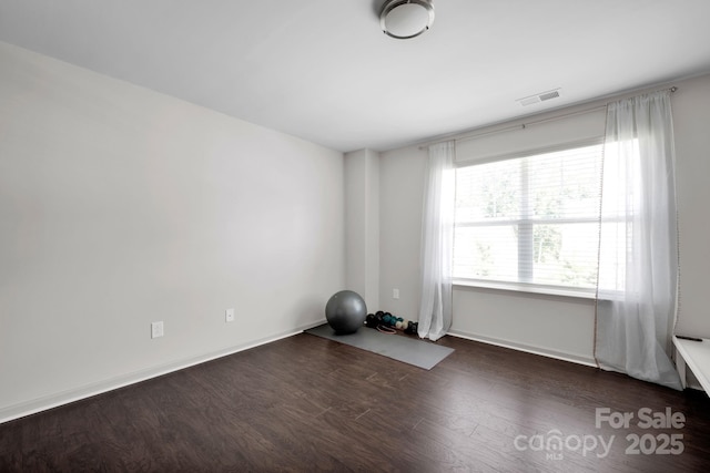 15127 Oleander Dr, Charlotte, NC 28278 - unfurnished room with wood finished floors, baseboards, and visible vents
