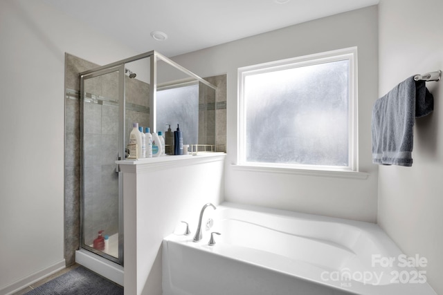 15127 Oleander Dr, Charlotte, NC 28278 - bathroom with a bath and a stall shower