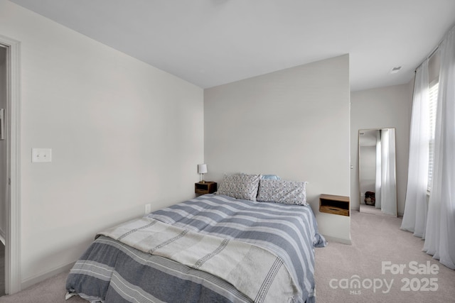 15127 Oleander Dr, Charlotte, NC 28278 - carpeted bedroom with baseboards