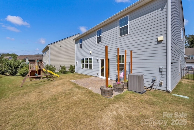 15127 Oleander Dr, Charlotte, NC 28278 - rear view of house with cooling unit, a patio area, a yard, fence, and a playground