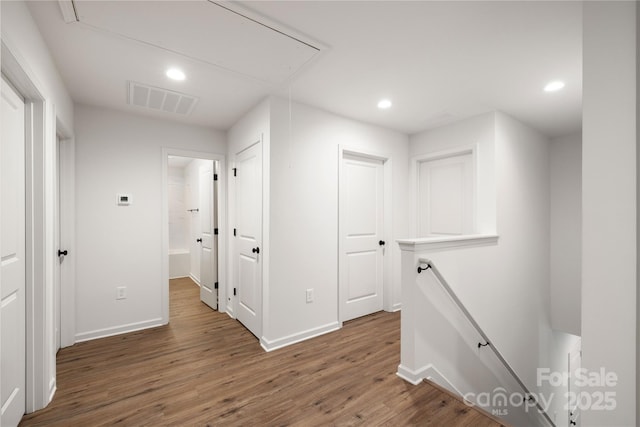6524 Robert St, Huntersville, NC 28078 - hallway featuring wood finished floors, an upstairs landing, attic access, visible vents, and recessed lighting