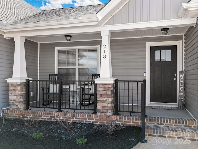 218 Little Man Dr, Boiling Springs, SC 29316 - doorway to property with board and batten siding and covered porch