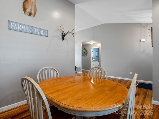 218 Little Man Dr, Boiling Springs, SC 29316 - dining space featuring lofted ceiling, baseboards, and wood finished floors