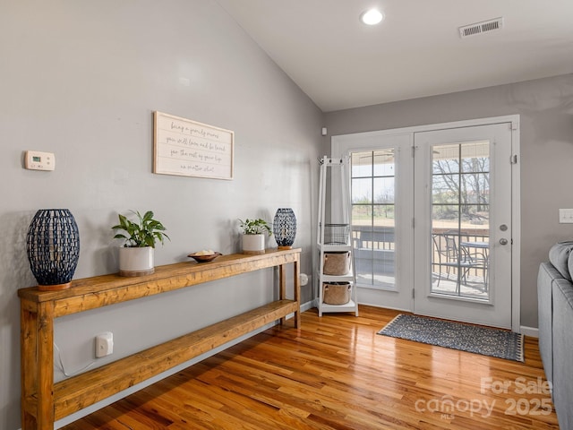218 Little Man Dr, Boiling Springs, SC 29316 - doorway featuring visible vents, baseboards, wood finished floors, and lofted ceiling