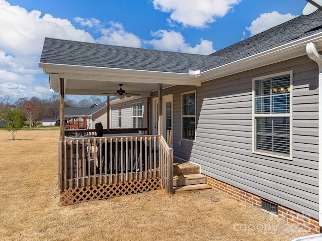 218 Little Man Dr, Boiling Springs, SC 29316 - view of exterior entry featuring a deck, roof with shingles, a ceiling fan, and visible vents