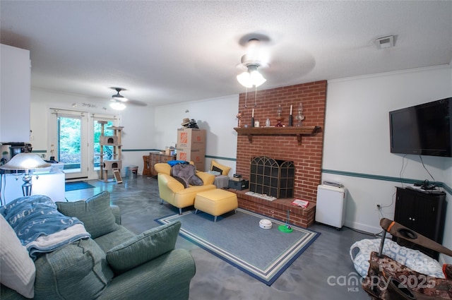 2540 Heritage Cir, Statesville, NC 28625 - living room with a ceiling fan, finished concrete flooring, and a brick fireplace