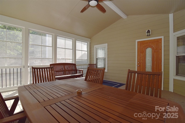 sunroom / solarium with beam ceiling
