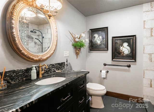 704 Fleetwood Plz, Hendersonville, NC 28739 - full bath featuring a tile shower, vanity, tile patterned floors, a chandelier, and toilet