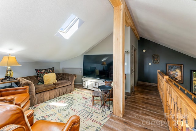 704 Fleetwood Plz, Hendersonville, NC 28739 - living area with a skylight, lofted ceiling, and wood finished floors