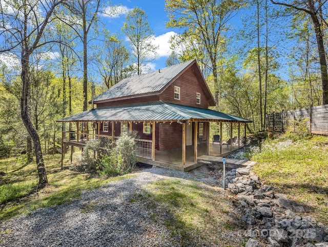 147 Cove Hollow Rd, Rutherfordton, NC 28139 - view of front of property with fence, covered porch, and metal roof