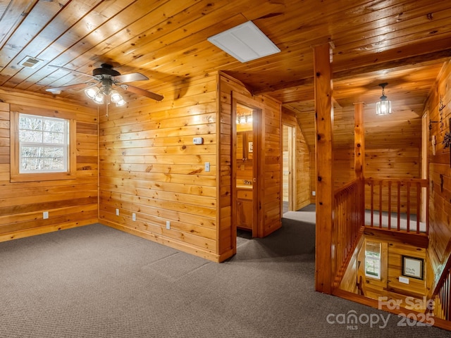 147 Cove Hollow Rd, Rutherfordton, NC 28139 - unfurnished room with wooden walls, carpet flooring, wood ceiling, and ceiling fan