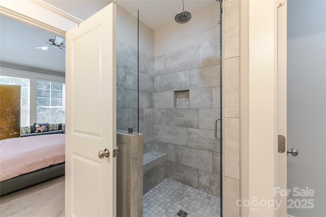 full bath with a tile shower and connected bathroom
