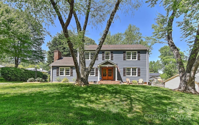 218 Kimrod Ln, Charlotte, NC 28270 - colonial inspired home with french doors, a front lawn, and a chimney