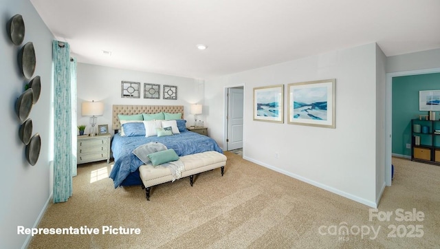 bedroom with carpet flooring and baseboards