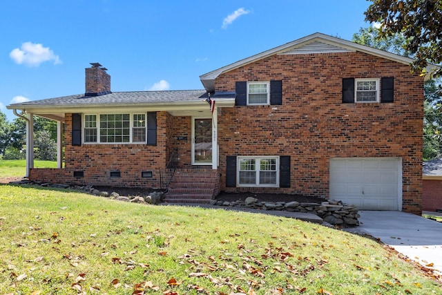 split level home with concrete driveway, a front lawn, a chimney, an attached garage, and brick siding