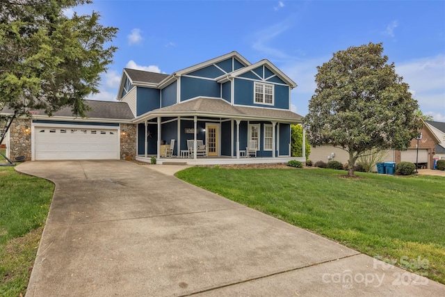 63 Frost Ln, Taylorsville, NC 28681 - view of front facade featuring covered porch, concrete driveway, a front yard, an attached garage, and stone siding