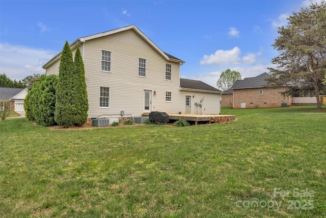 63 Frost Ln, Taylorsville, NC 28681 - back of property with a wooden deck, a lawn, and central air condition unit